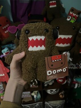 Domo plush wearing headphones new with tags